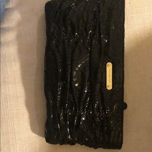 Michael Kors Ptent Leather Clutch